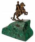 A LARGE GILT BRONZE STATUE OF PETER THE GREAT AS THE HORSEMAN ON A MALACHITE BASE