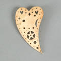 Sailors carved bone heart form needle case 19th c