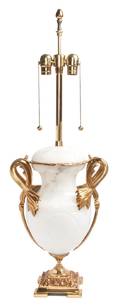 An Onyx and Gilt Metal Lamp