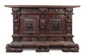 A German Relief Carved Oak Cabinet