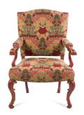 A Venetian Red Lacquered and Parcel Gilt Fauteuil