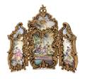 An Austrian Enameled Gilt Metal ThreePanel Table Screen