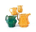 Four Salamander works pottery pitchers