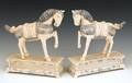 Pair of Chinese carved ivory horses on plinths early 20th c