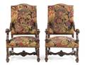 A Pair of Louis XIV Style Walnut Fauteuils