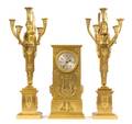 An Empire Style Gilt Bronze Clock Garniture