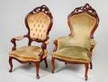 TWO VICTORIAN ROCOCO REVIVAL WALNUT ARMCHAIRS