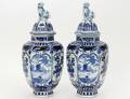 PAIR OF DELFTWARE LIDDED URNS