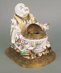 Sampson porcelain seated Chinaman late 19th c