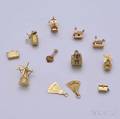 Twelve 14kt Gold Travelthemed Charms