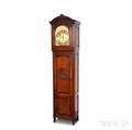 Walnut Carved Quarterchiming Tall Clock