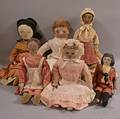 Six Painted Oilcloth Rag Dolls