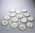 Fourteen Royal Copenhagen Flora Danica Dessert Plates