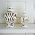 Two White Ceramic Reticulated Balusterform Vases
