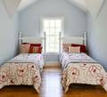 Pair of Cottage Whitepainted Twin Bed Frames with Comforters Throw Pillows and Six Accent Cushions