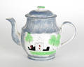 Blue spatter teapot with a fort and a tree 19th c