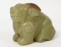 FINE JADE CARVING OF A SEATED HORNED MYTHICAL BEAS