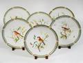 SET OF SIX ENGLISH PAINTED PORCELAIN BIRD PLATES