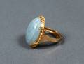 FOURTEEN KARAT GOLD AND JADE DOME RING