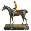 Continental gilt and patinated white metal sculpture of a horse and jockey late 19thearly 20th c
