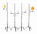 Four 18th c style wrought iron electric floor lamps