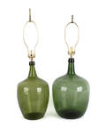 Two green glass demijohns