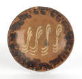 Pennsylvania redware plate 19th c