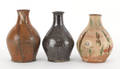 Three Pennsylvania or Virginia redware bottles 19th c