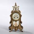 Louis XVIstyle Gilt and Porcelain Shelf Clock