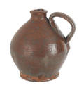 Two Pennsylvania redware jugs 19th c