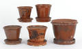 Five Pennsylvania redware flower pots 19th c