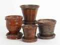 Four Pennsylvania redware flower pots attributed to Willoughby Smith 19th c