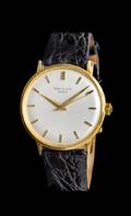 An 18 Karat Yellow Gold Ref 3411 Wristwatch Patek Philippe Circa 1960