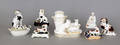 Collection of seven Staffordshire and porcelain dog and cat figures