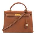 An Hermes Brown Leather Kelly Handbag