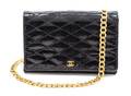 A Chanel Black Lizard Clutch