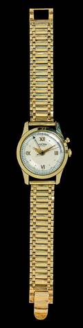 A 14 Karat Yellow Gold Cricket Alarm Wristwatch Vulcain
