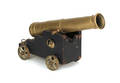 Large brass and wood signal cannon