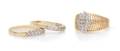 A Collection of 14 Karat Yellow Gold and Diamond Rings