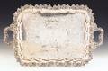 Two large silver plated trays with cast grapevine edges