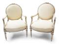 A Pair of Louis XVI Style Painted Fauteuils