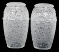 A Pair of Lalique Molded and Frosted Glass Covered Vases