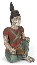 A Burmese Carved and Painted Seated Figure