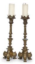 A Pair of Brass Candlesticks