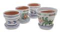 A Group of Four Painted Terracotta Planters
