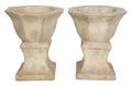 A Pair of Cast Stone Urns