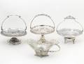 SET OF FOUR AESTHETIC MOVEMENT SILVER PLATED BASKETS