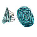 Two large zuni needlepoint turquoise cuffs