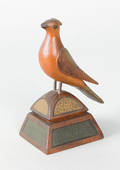 DecoTex carved and painted maple song bird on a pedestal late 19th c