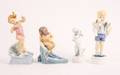 Group of 4 Porcelain Figurines of Children